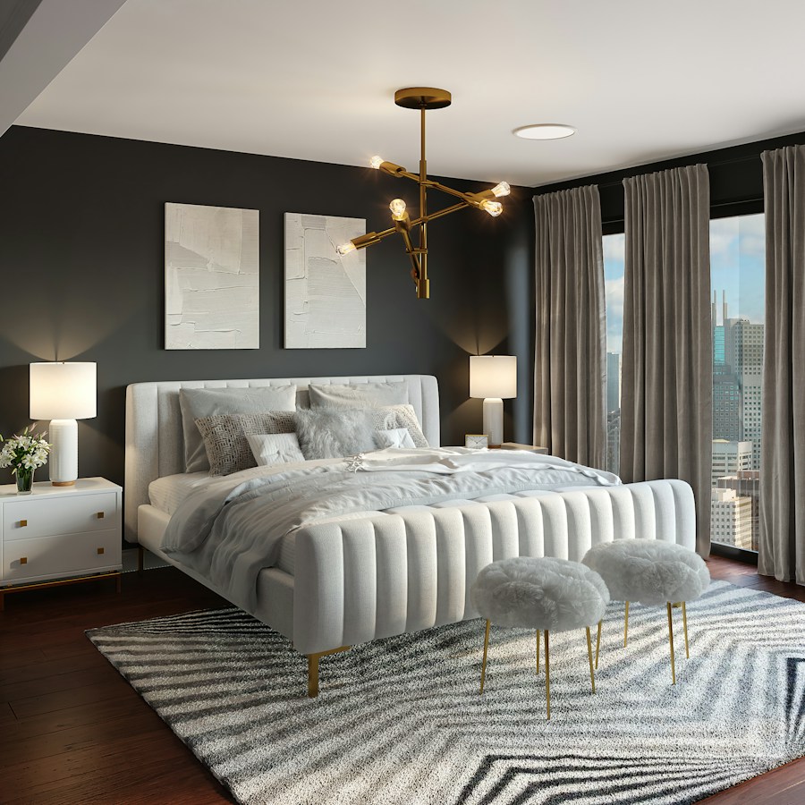 Quarto claro com mobiliário e iluminação aconchegante